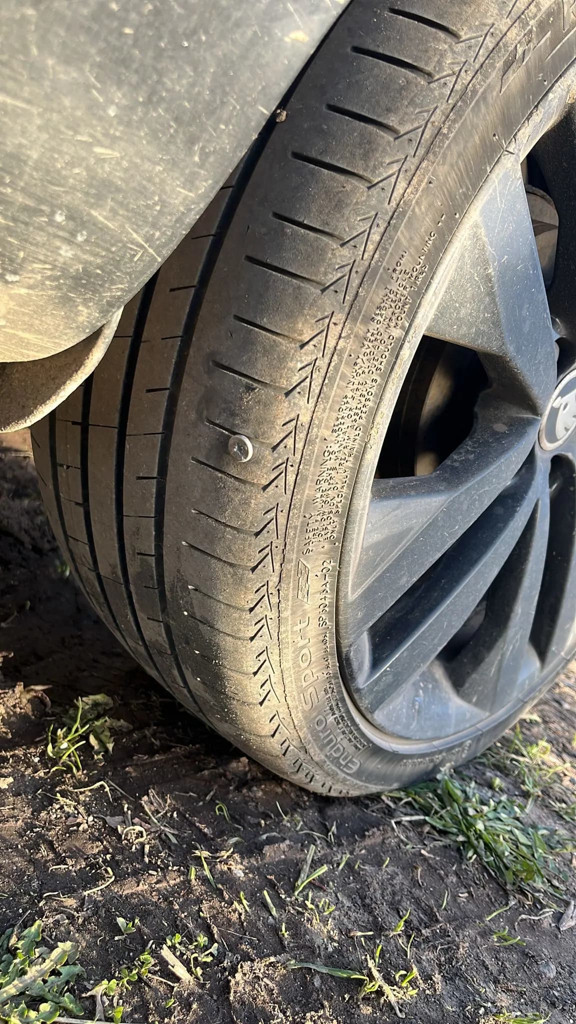 Tyre puncture from a screw before mobile repair or replacement